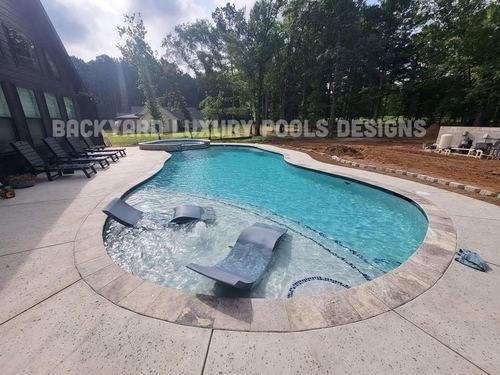 Custom pool project by Backyard Luxury Pool Designs
